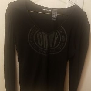 A DKNY black shirt.